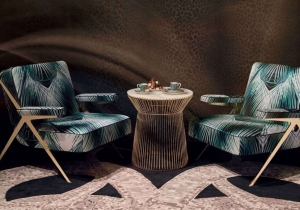 furniture: FIJI ARMCHAIR WITH ITS IRRESISTIBLE FIFTIES CHARM REVISITED IN A CONTEMPORARY KEY, THE FIJI ARMCHAIR IS CHARACTERIZED BY THE DYNAMISM AND ESSENTIALITY OF THE LINES. PRESENTED THIS YEAR WITH THE NEW SILK UPHOLSTERY WITH BANANA LEAF PRINT, THE FIJI ARMCHAIR | ARCHONTIKIS - ROBERTO CAVALLI