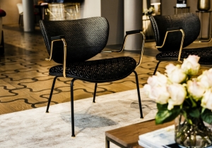 furniture: CALIDA LOUNGE: ARMCHAIR WITH BASE IN MATT BLACK VARNISHED METAL ROD. SEAT, BACK IN CURVED BEECH WOOD, PADDING IN HIGH-RESILIENCE EXPANDED POLYURETHANE. METAL GLIDES AND ARMREST (OPTIONAL) IN POLISHED GOLD FINISHING. | ARCHONTIKIS - BLACKTIE